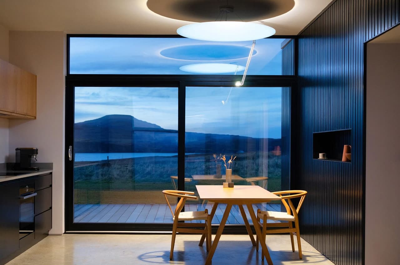 Sunday Light, premium indoor sunlight machine in a modern kitchen with landscape view